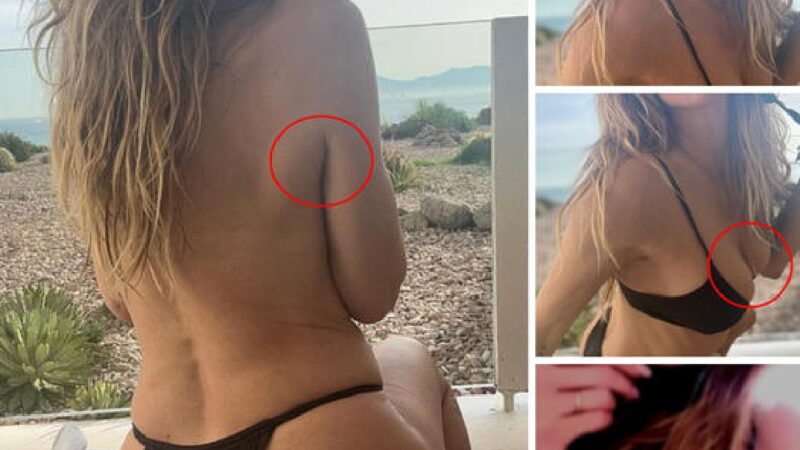 Heidi Klum goes braless as she strips down into string bikini for sultry beach snap….